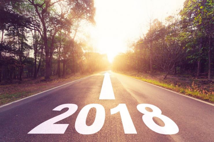 Road with 2018 and an arrow pointing forwards