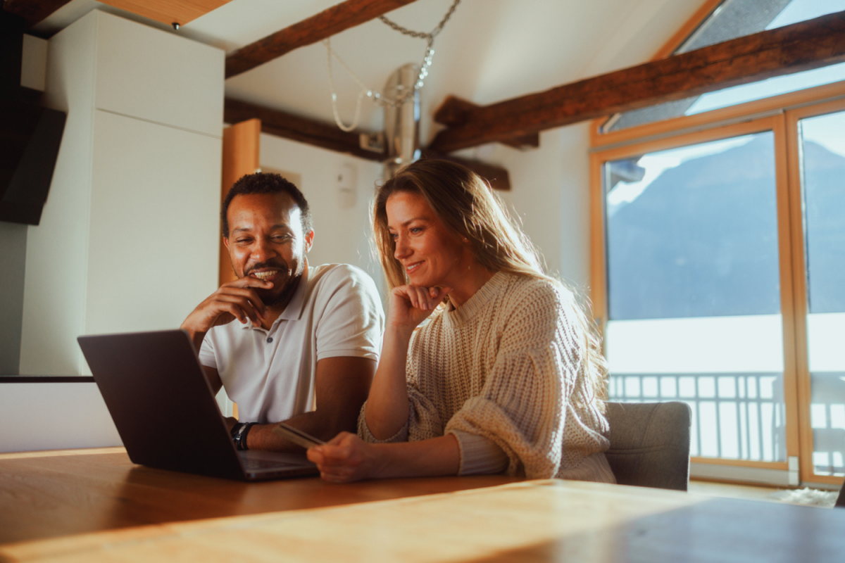 Man on woman looking at the laptop