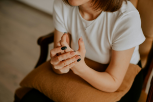 Woman&#039;s hands clasped