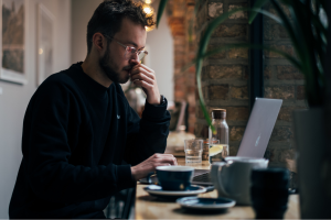 Man looking at his laptop