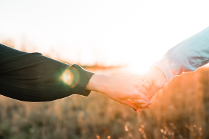 Couple holding hands