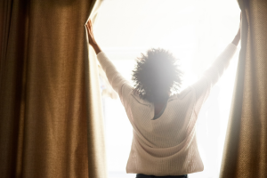 Woman standing at the window