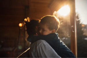 Mum hugging child