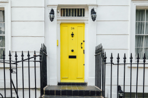 Yellow door to a town houe