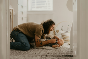 Dad looking after his baby