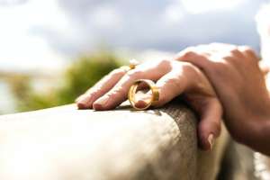 Women holding wedding ring